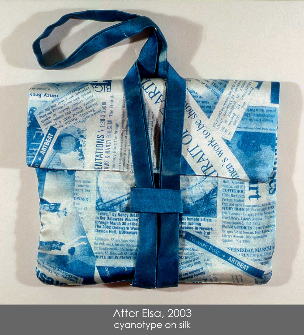 Cyanotype on silk, sewn into a small handbag.  The print is collages press clippings about my work, inspired by fabric by Elsa Schiaparelli.